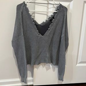 Grey womens sweater with frills